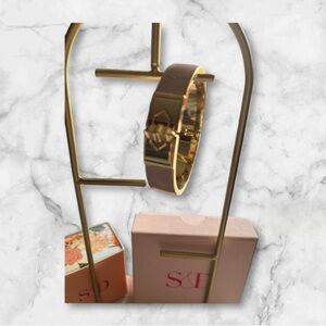 New Stella & Dot bracelet. Bangle is hinged and magnetic in blush pink and gold